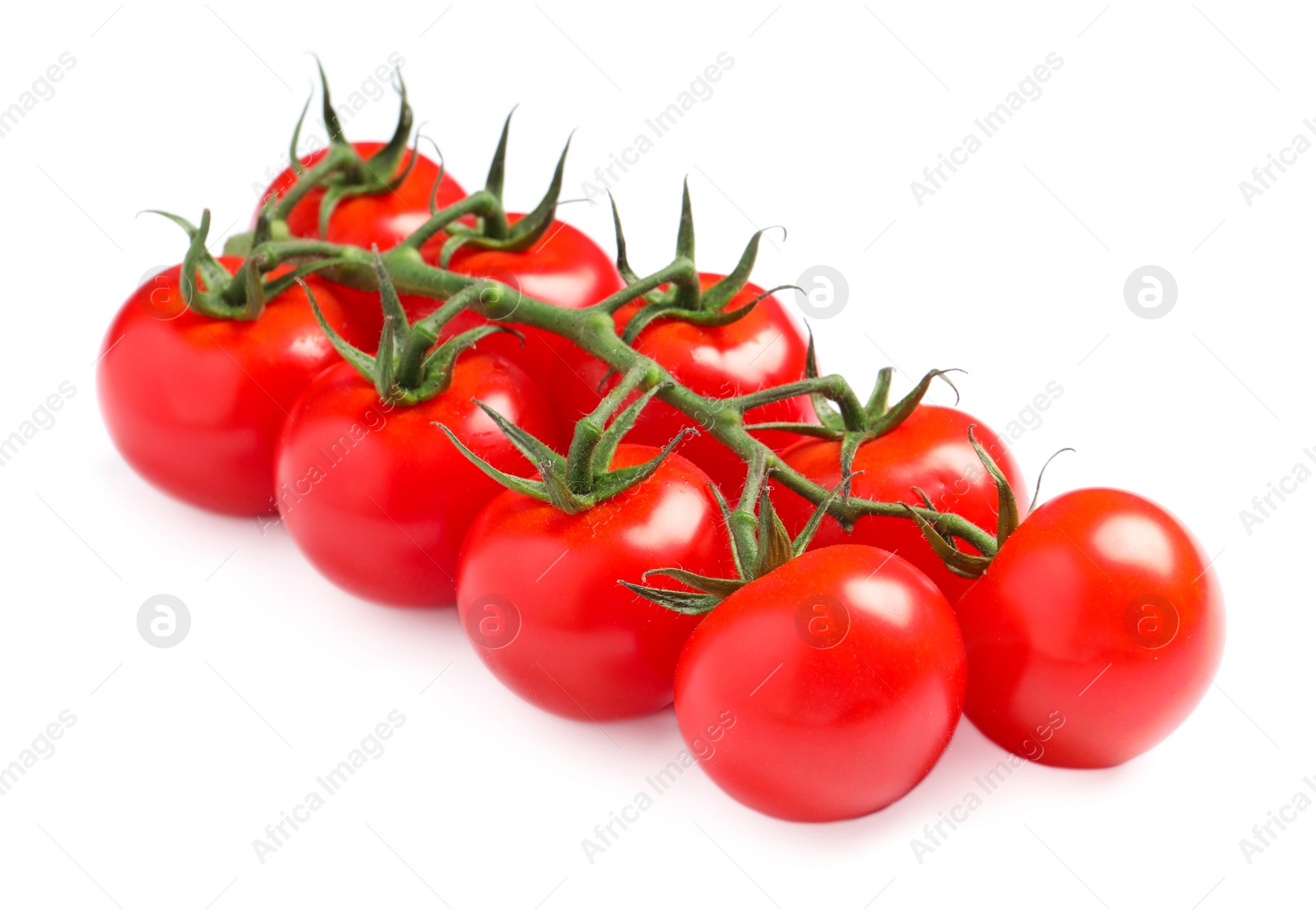 Photo of Branch of fresh cherry tomatoes isolated on white