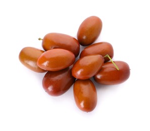 Photo of Heap of ripe red dates on white background, top view