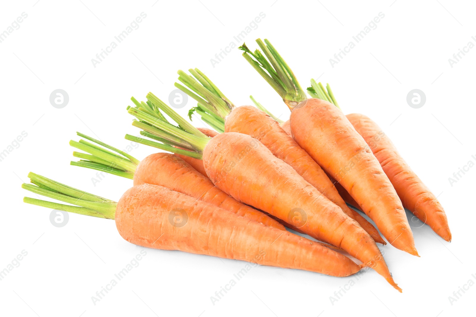 Photo of Pile of fresh ripe carrots isolated on white