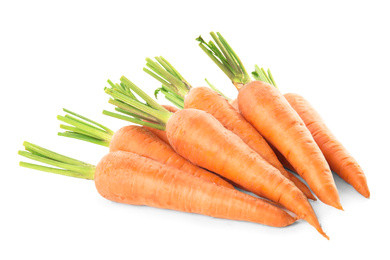 Photo of Pile of fresh ripe carrots isolated on white