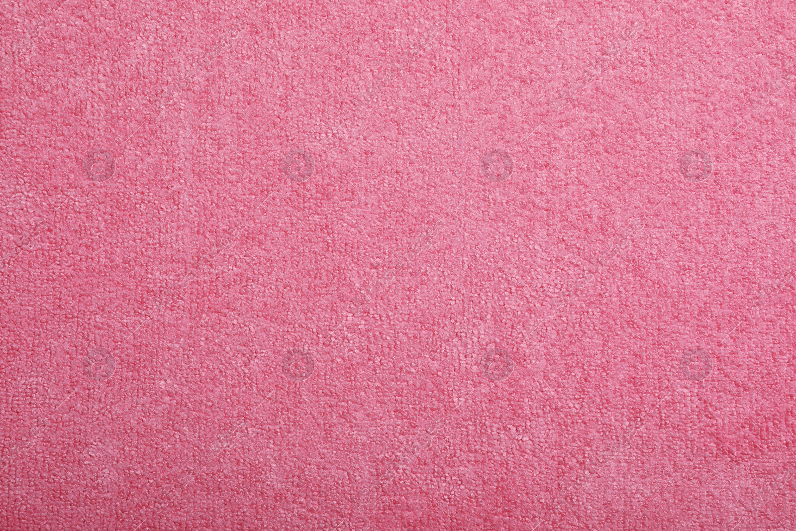 Photo of Pink microfiber cloth as background, top view