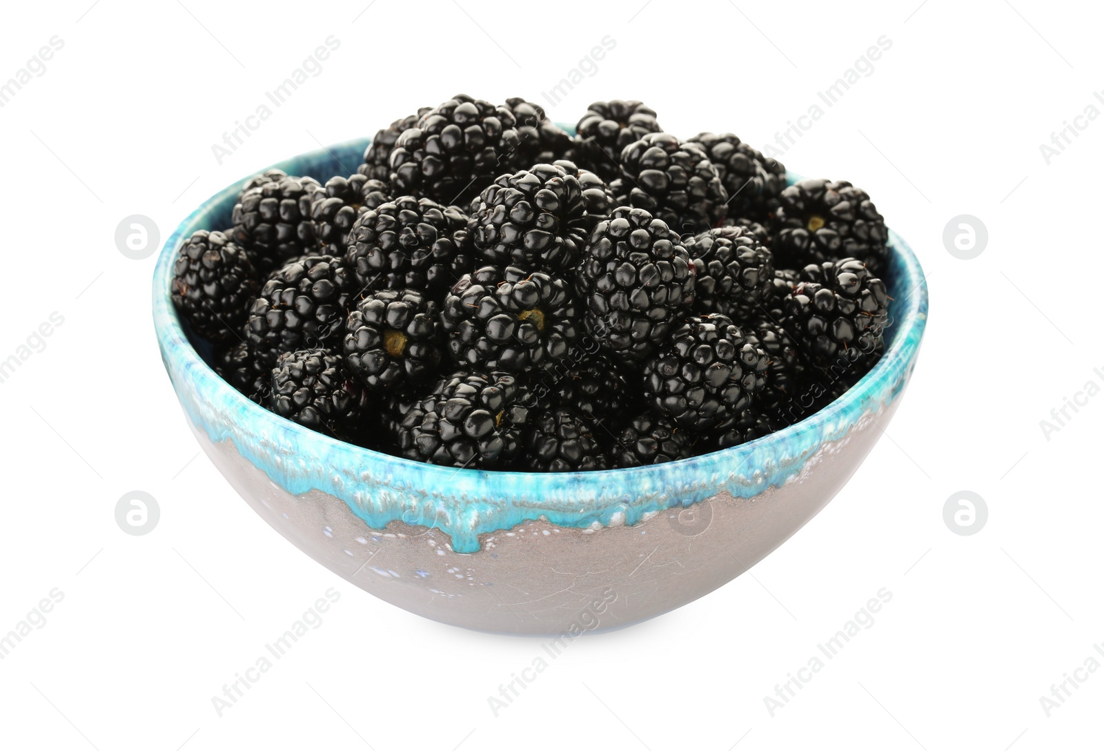 Photo of Tasty ripe blackberries in bowl isolated on white