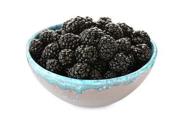 Tasty ripe blackberries in bowl isolated on white