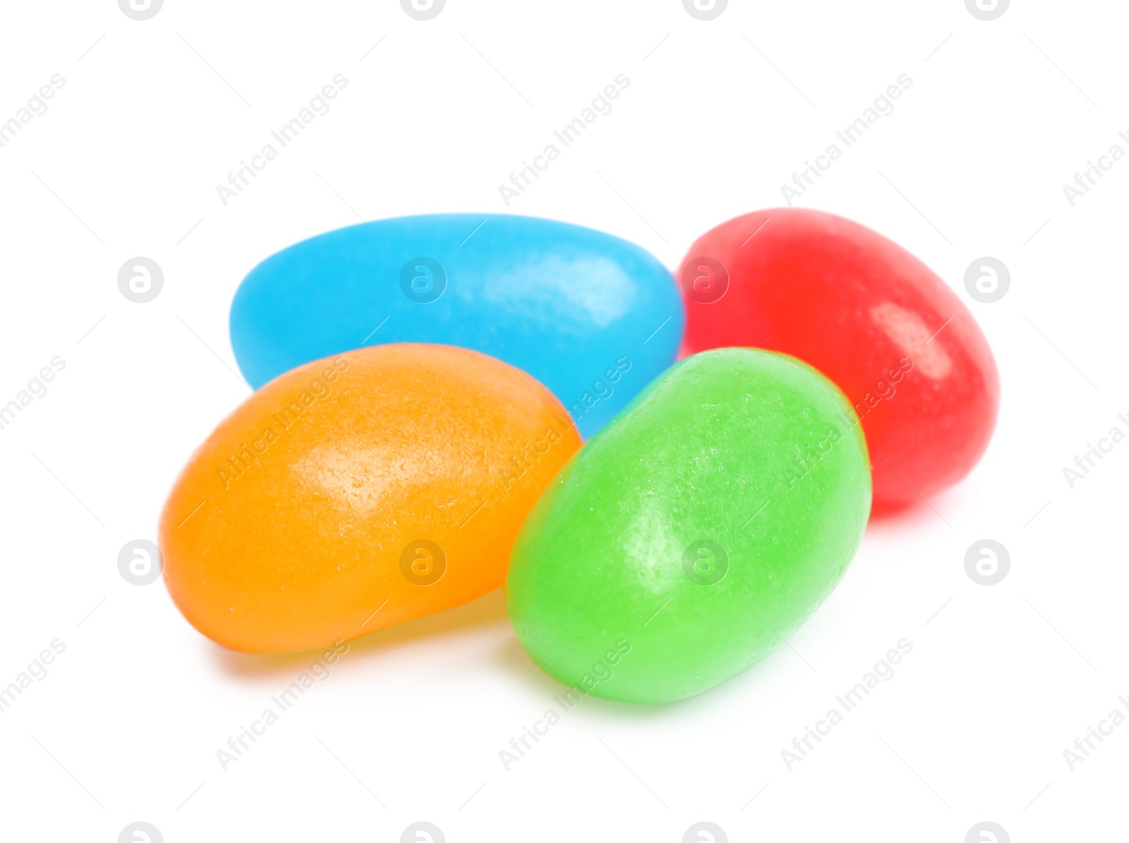 Photo of Delicious colorful jelly beans isolated on white