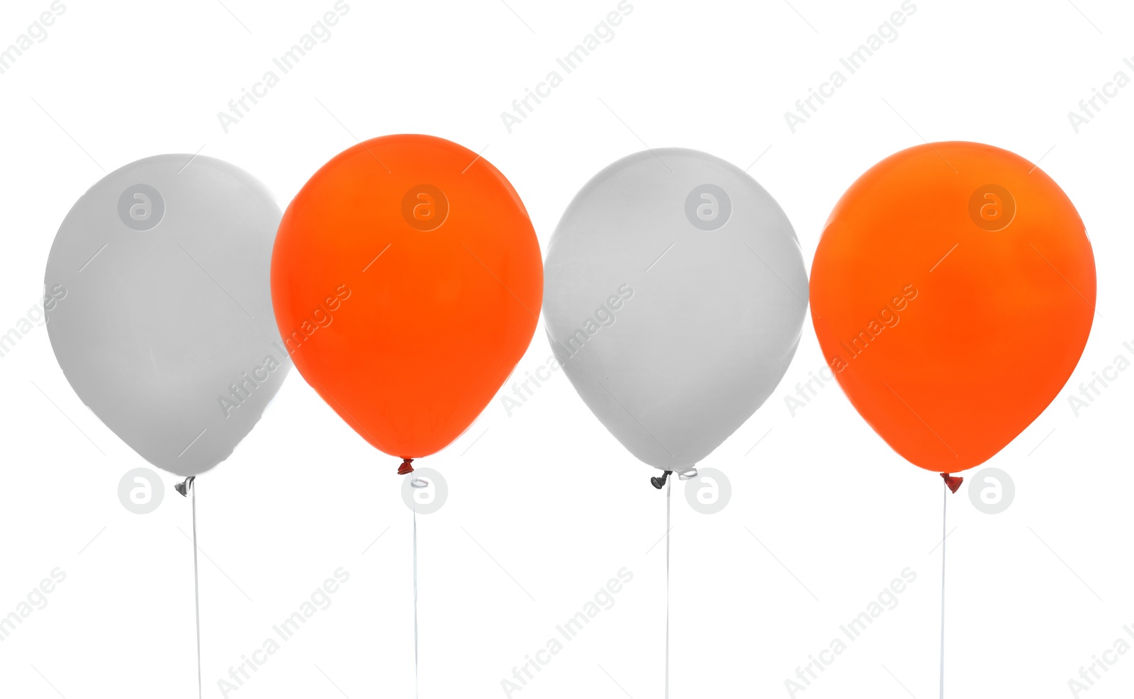 Photo of Colorful balloons on white background. Halloween party