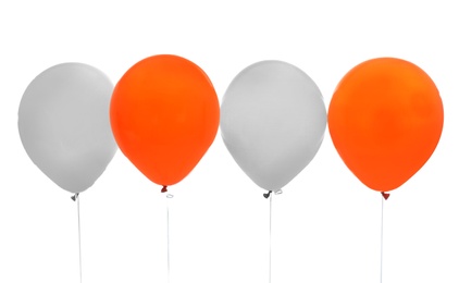 Photo of Colorful balloons on white background. Halloween party