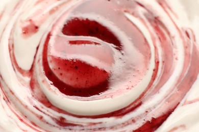 Tasty yoghurt with jam as background, closeup