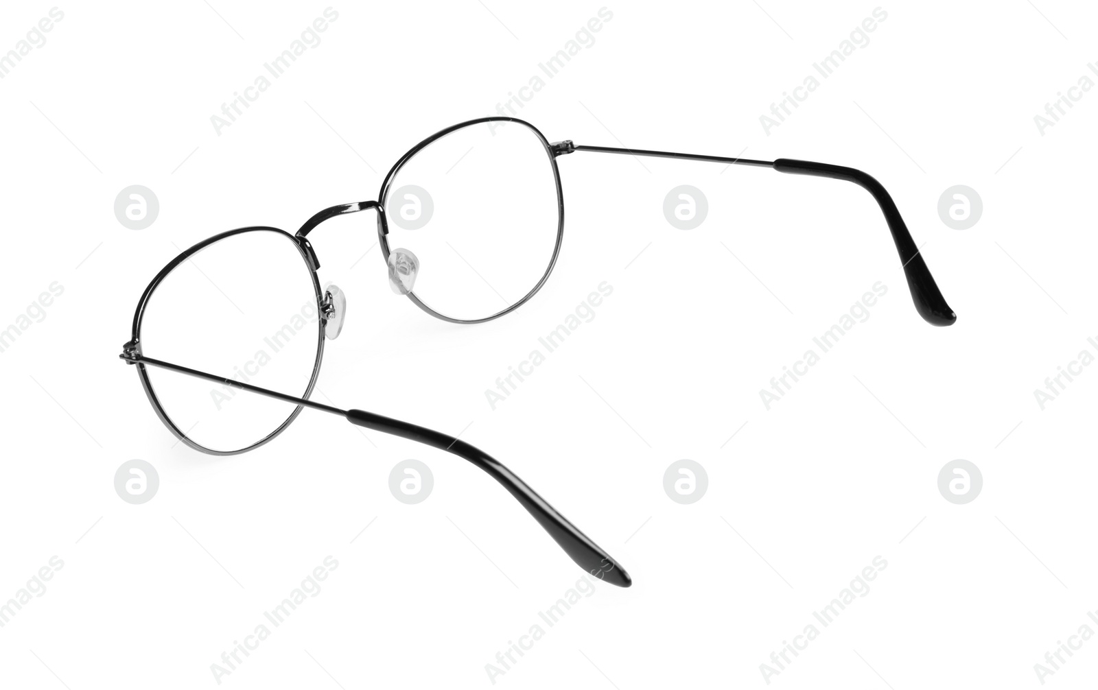 Photo of Stylish pair of glasses isolated on white