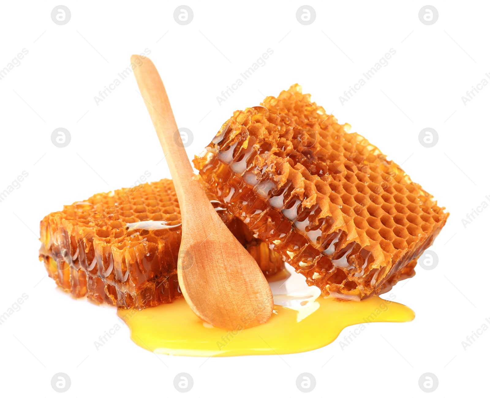 Photo of Fresh honeycombs and spoon on white background