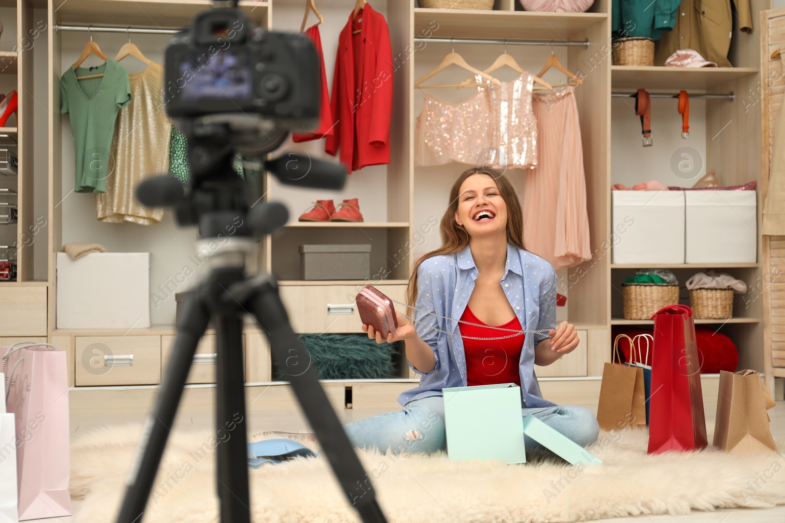 Photo of Fashion blogger recording new video in room