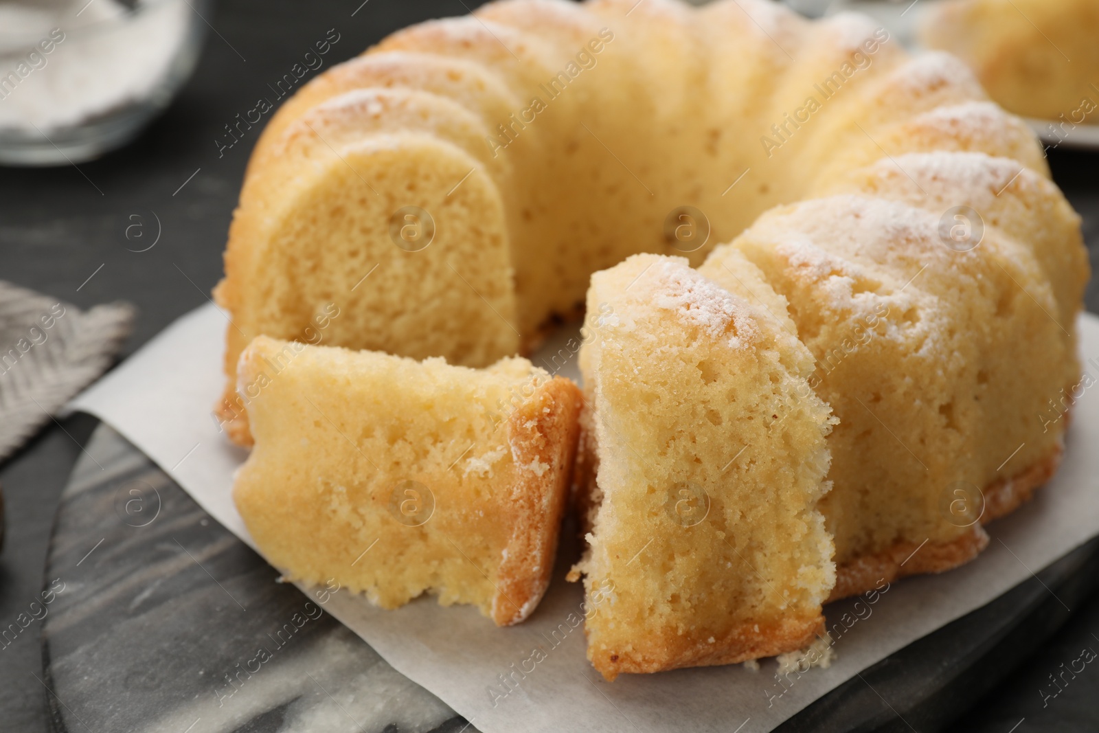 Photo of Delicious freshly baked sponge cake on table, closeup