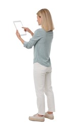 Photo of Woman using tablet with blank screen on white background