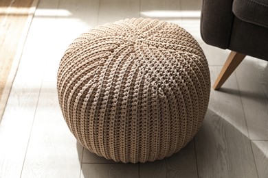 Stylish comfortable pouf in room. Home design