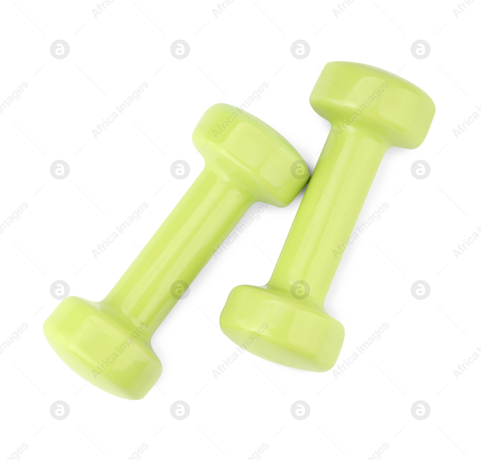 Photo of Light green dumbbells isolated on white, top view. Sports equipment