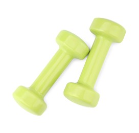 Photo of Light green dumbbells isolated on white, top view. Sports equipment