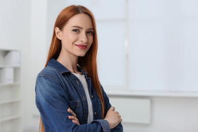 Photo of Portrait of beautiful young woman at home, space for text