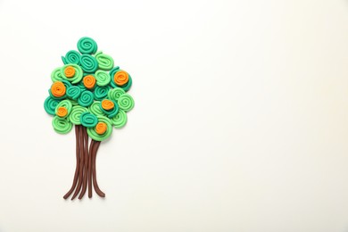 Beautiful tree made of plasticine on white background, top view