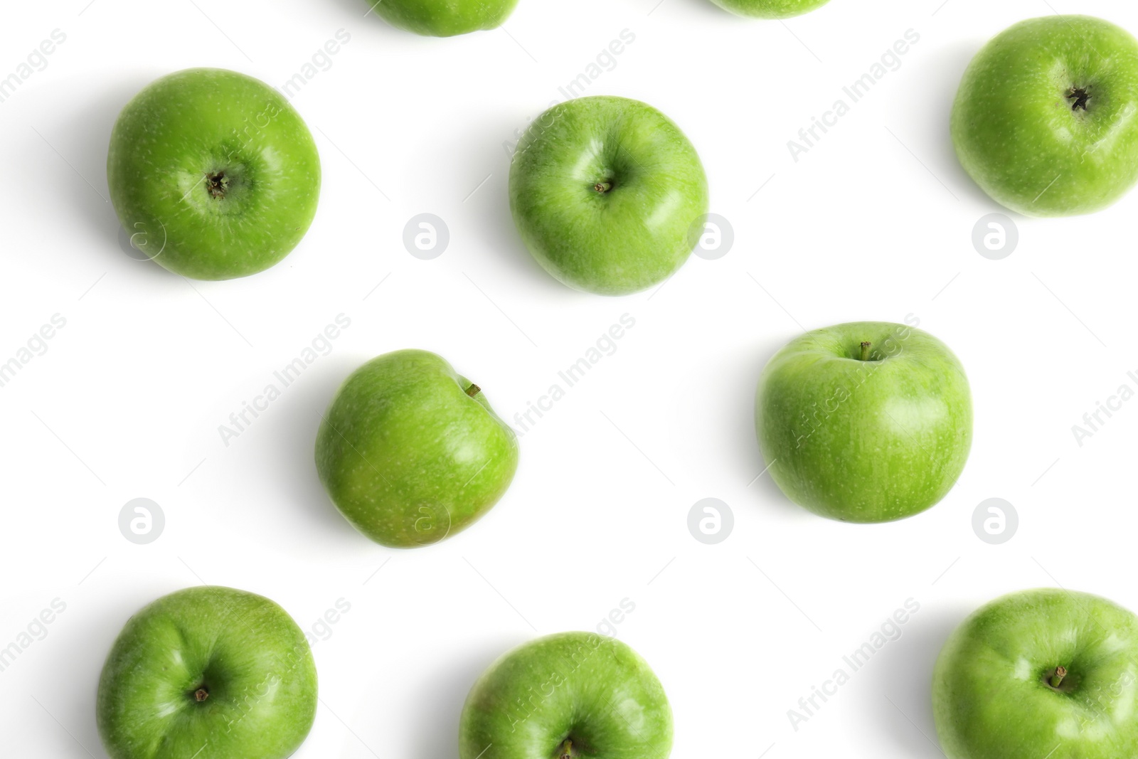 Photo of Fresh green apples on white background, top view