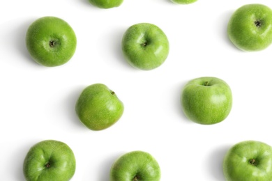 Photo of Fresh green apples on white background, top view