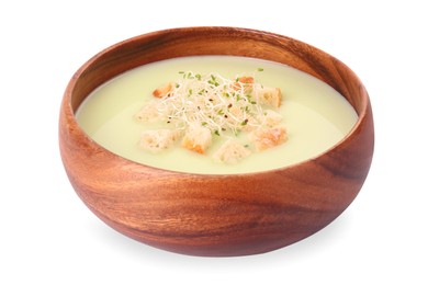 Photo of Bowl of tasty leek soup with croutons isolated on white