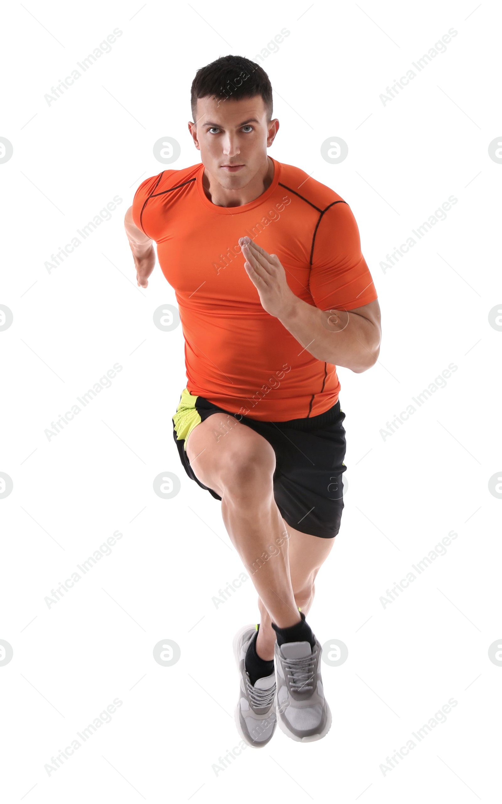 Photo of Athletic young man running on white background