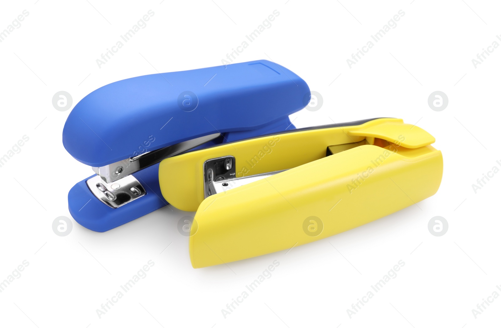 Photo of Two new bright staplers isolated on white