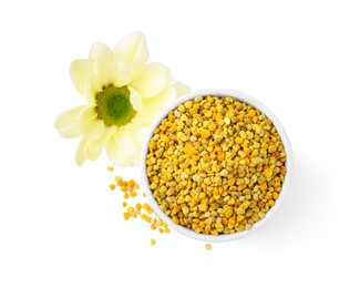 Photo of Fresh bee pollen granules and flower isolated on white, top view