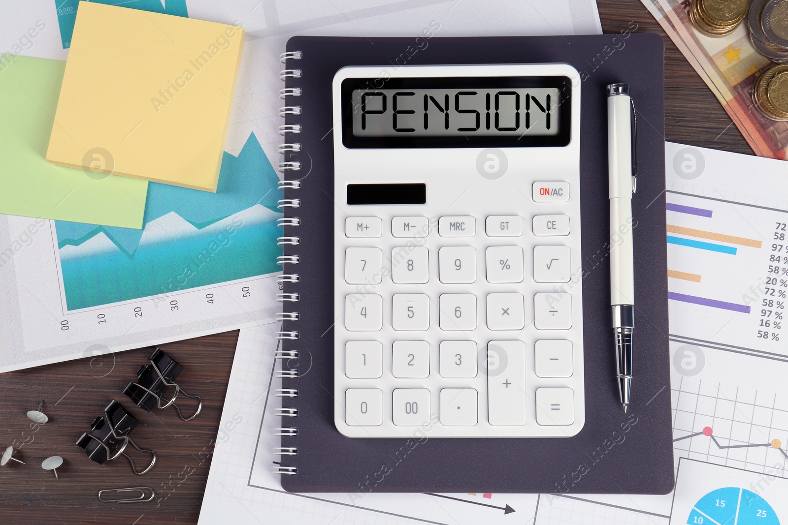 Image of Calculator with word Pension, documents, money and stationery on wooden table, flat lay