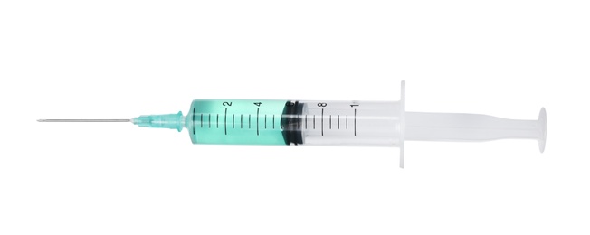 Plastic syringe with medicament on white background. Medical care