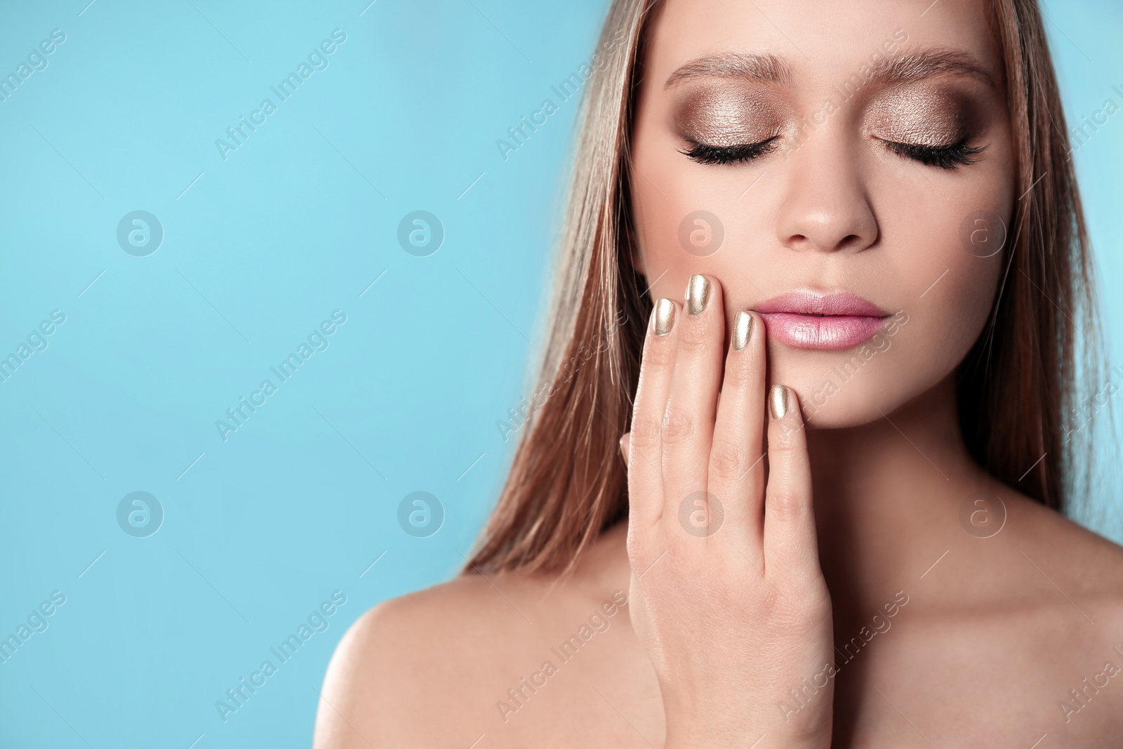 Photo of Beautiful woman with stylish nail polish on color background, space for text