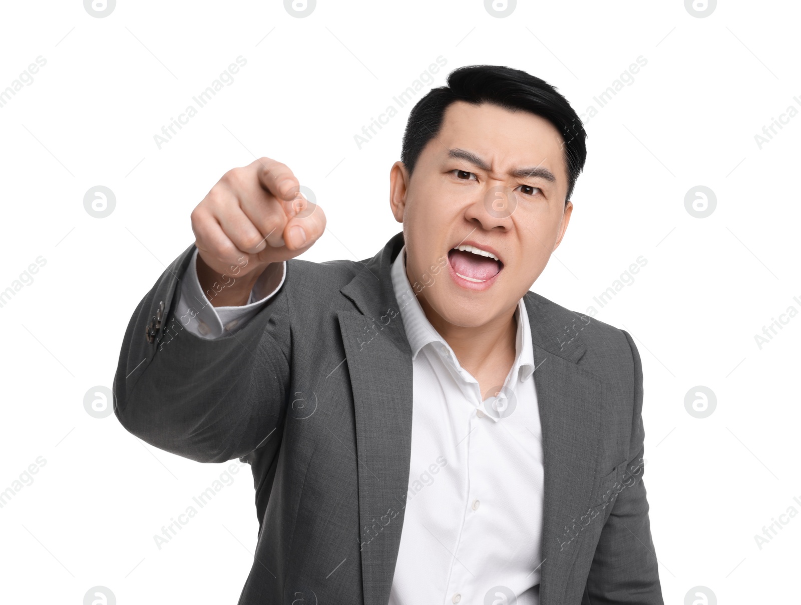 Photo of Angry businessman in suit screaming on white background