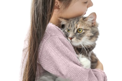 Photo of Cute little girl with cat near window at home