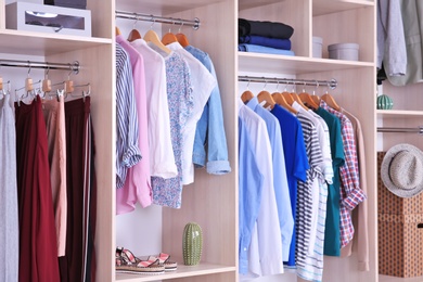 Photo of Large wardrobe with different clothes