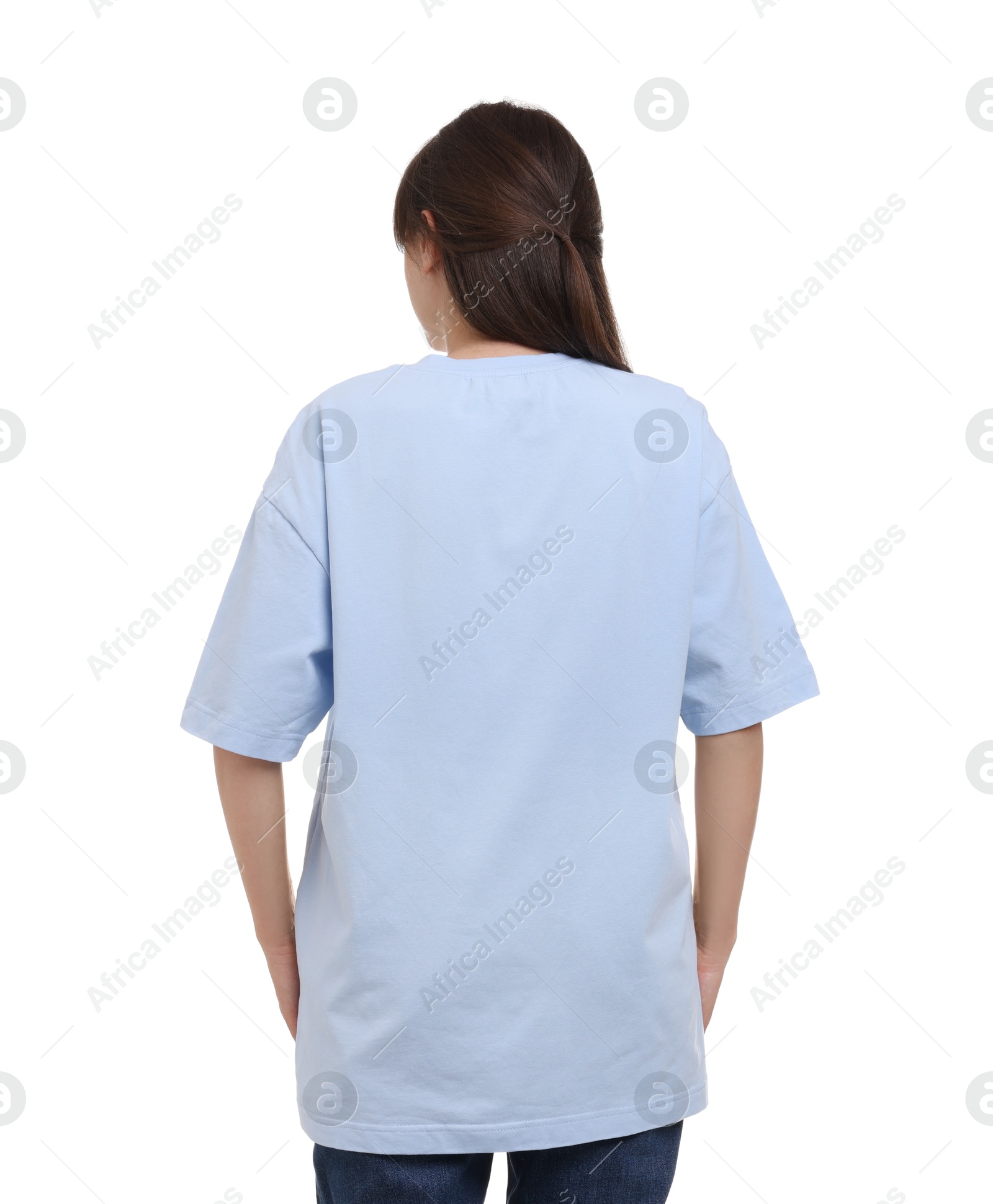 Photo of Woman in stylish light blue t-shirt on white background, back view