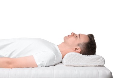 Photo of Man sleeping on orthopedic pillow against white background