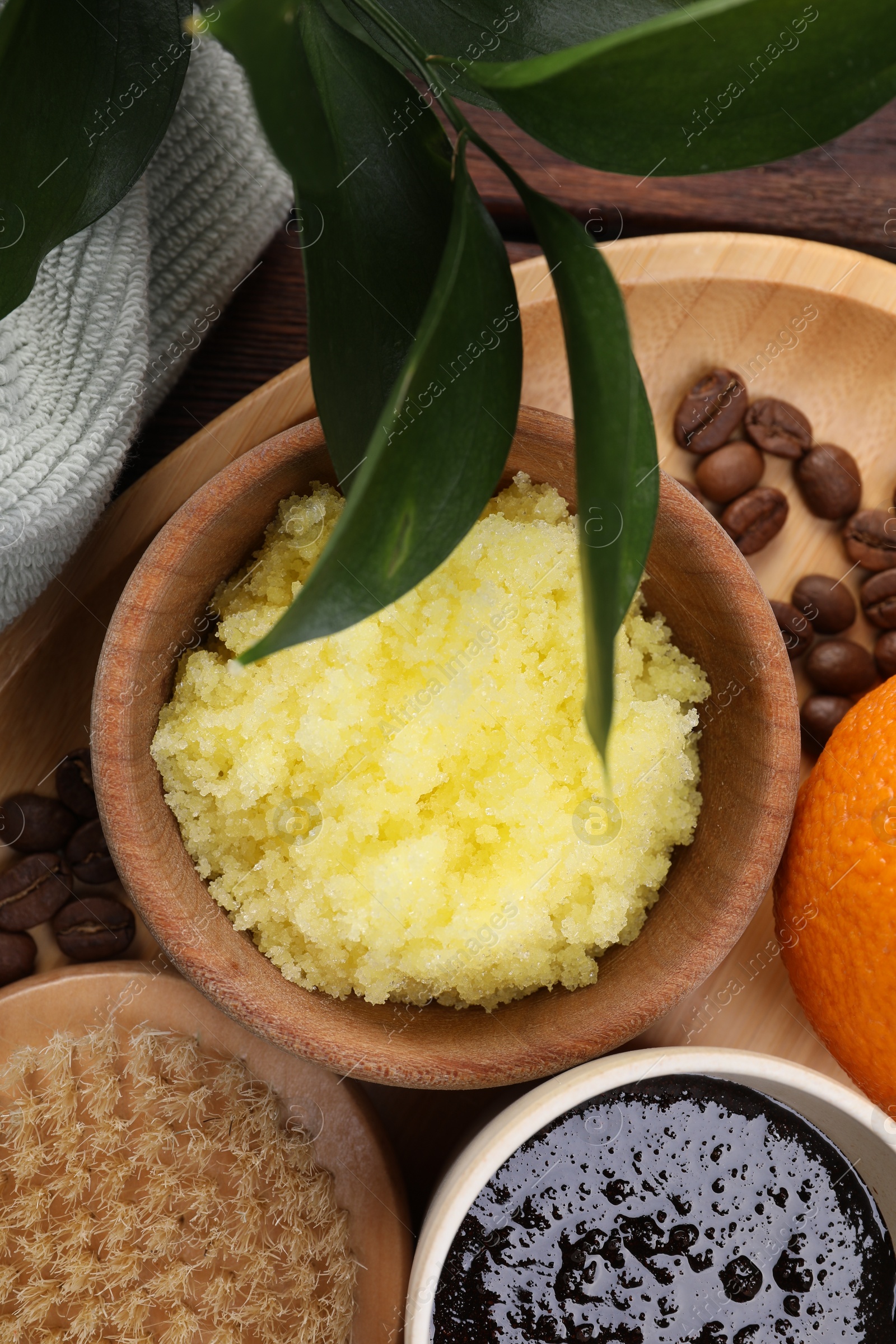 Photo of Flat lay composition with natural body scrubs on table. Anti cellulite treatment