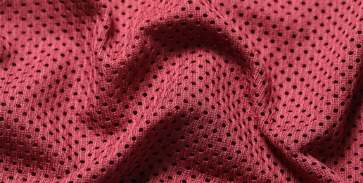 Texture of burgundy fabric as background, closeup