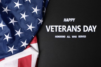 Image of Veterans day. Honoring all who served. American flag on black background, top view