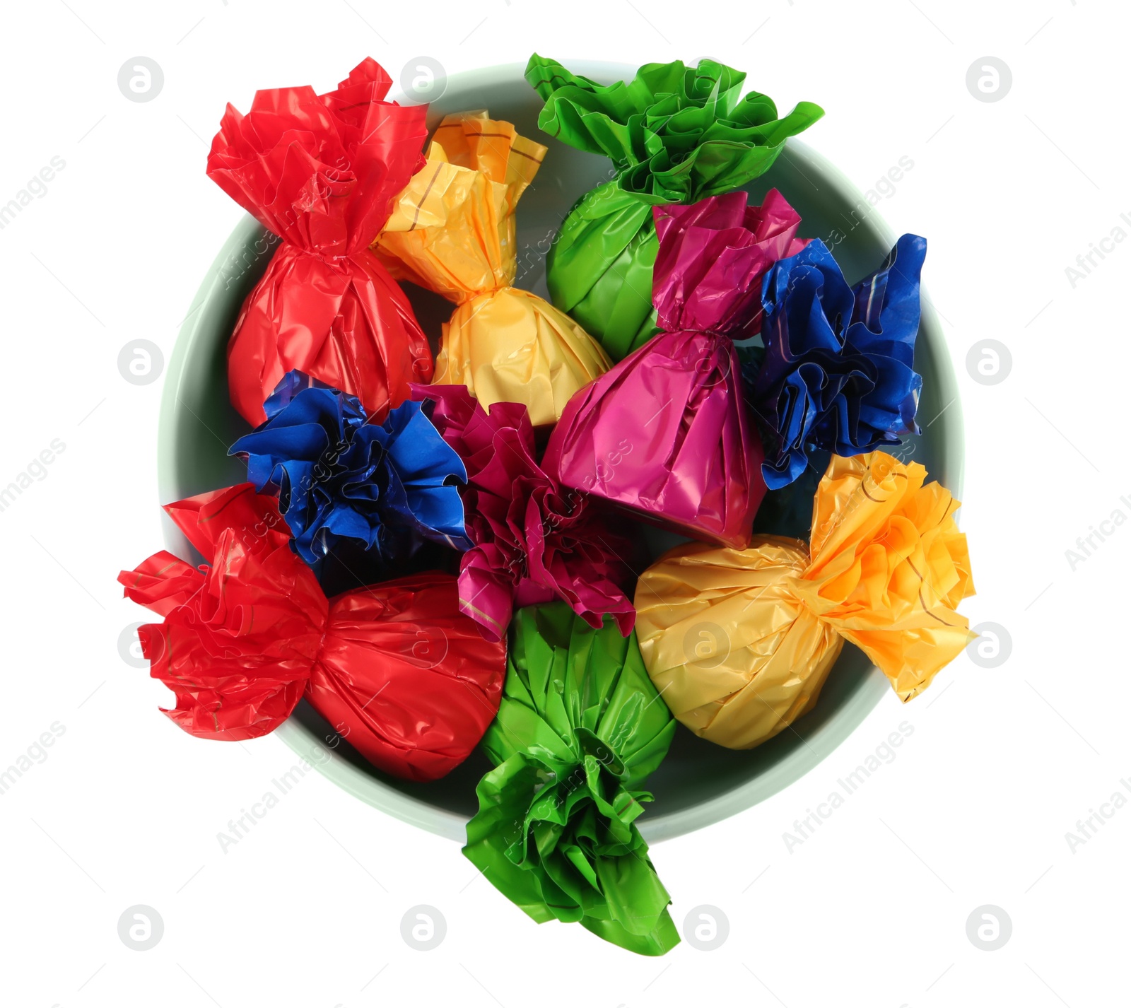 Photo of Bowl with candies in colorful wrappers isolated on white, top view