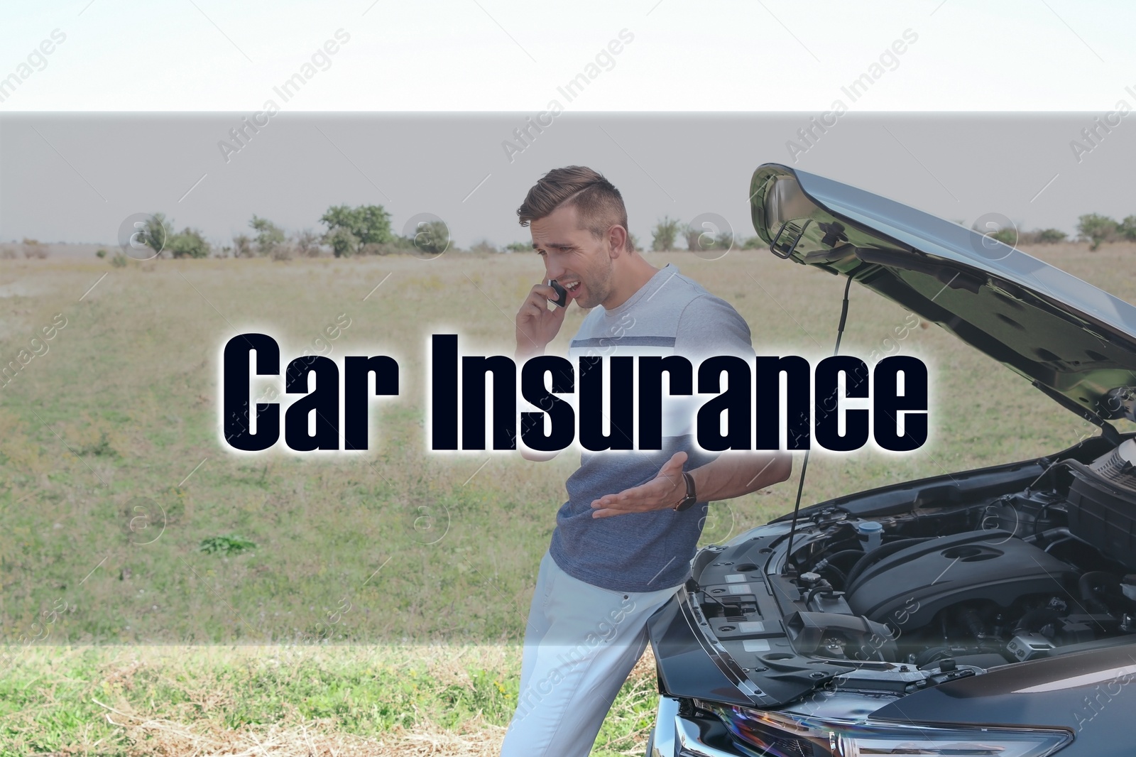 Image of Man talking on phone near broken auto outdoors. Car insurance