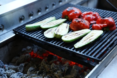 Photo of Grill with cut vegetables. Delicious street food