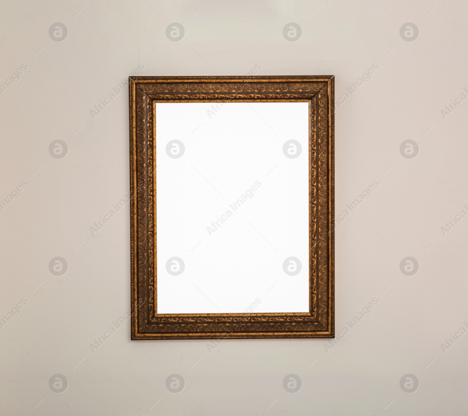 Photo of Frame with empty canvas on wall in modern art gallery. Mockup for design