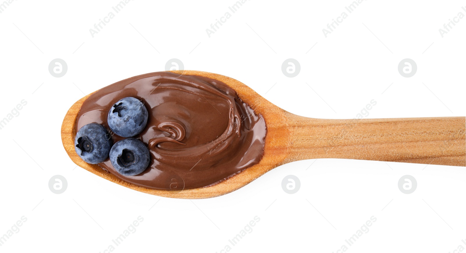 Photo of Wooden spoon with delicious chocolate paste and blueberries isolated on white, top view