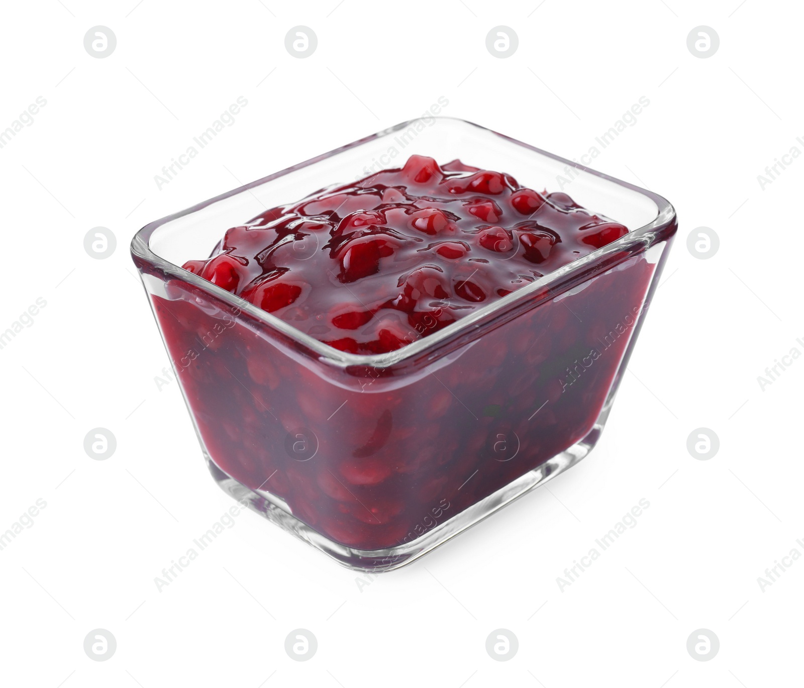 Photo of Fresh cranberry sauce in glass bowl isolated on white