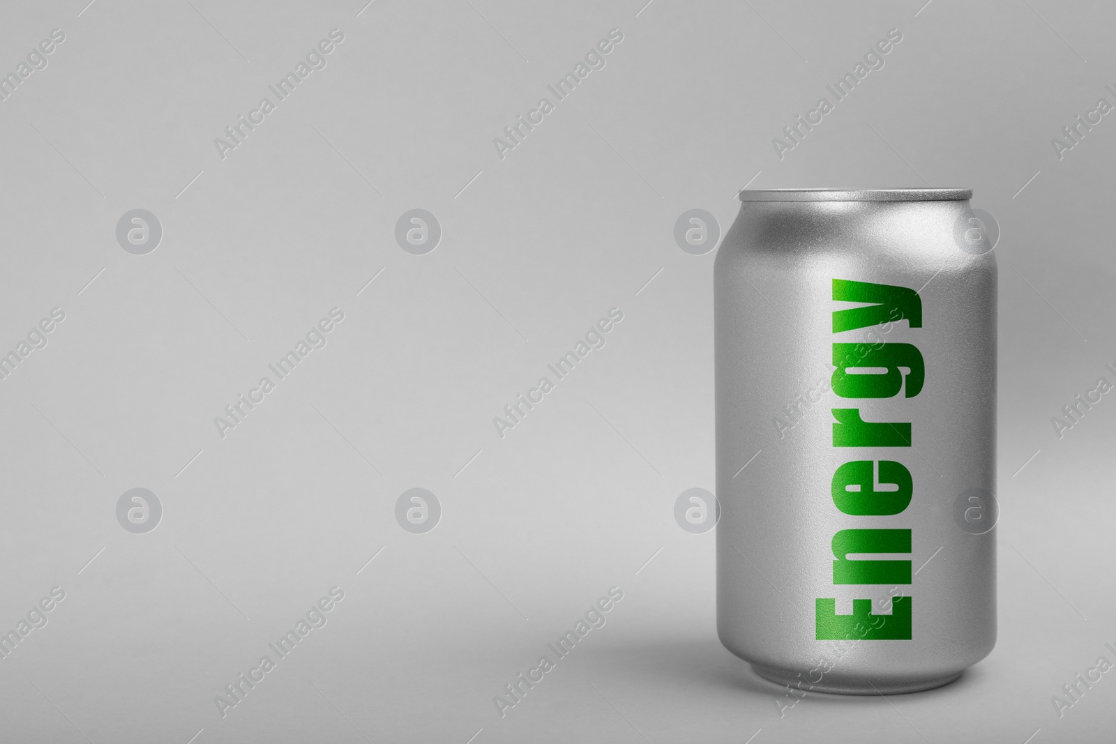 Image of Can of energy drink on light grey background. Space for text