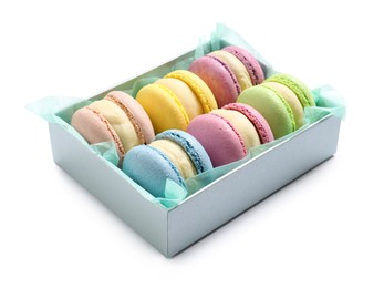 Photo of Many delicious colorful macarons in box on white background