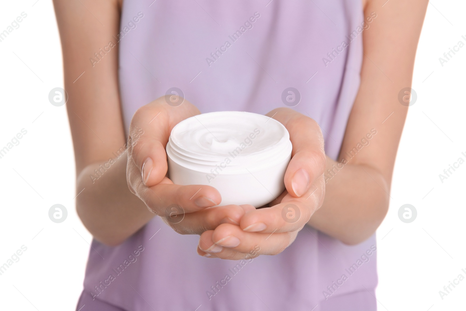 Photo of Young woman holding jar with hand cream, closeup