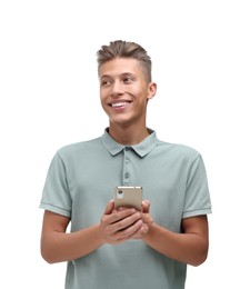 Happy young man sending message via smartphone on white background