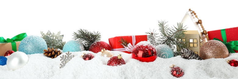 Christmas decoration on snow against white background