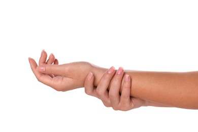 Photo of Woman showing hands with nude manicure on white background, closeup